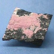 Pink Bustamite with Franklinite